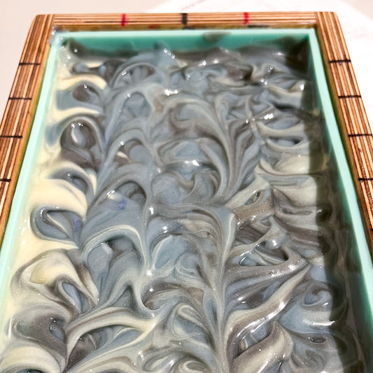 a batch of cold process soap in a wood and silicone mold scented with Earl Grey essential oil blend